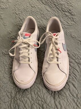 Nike Women’s White Low-Top Sneakers with Pink and Light Blue Accents